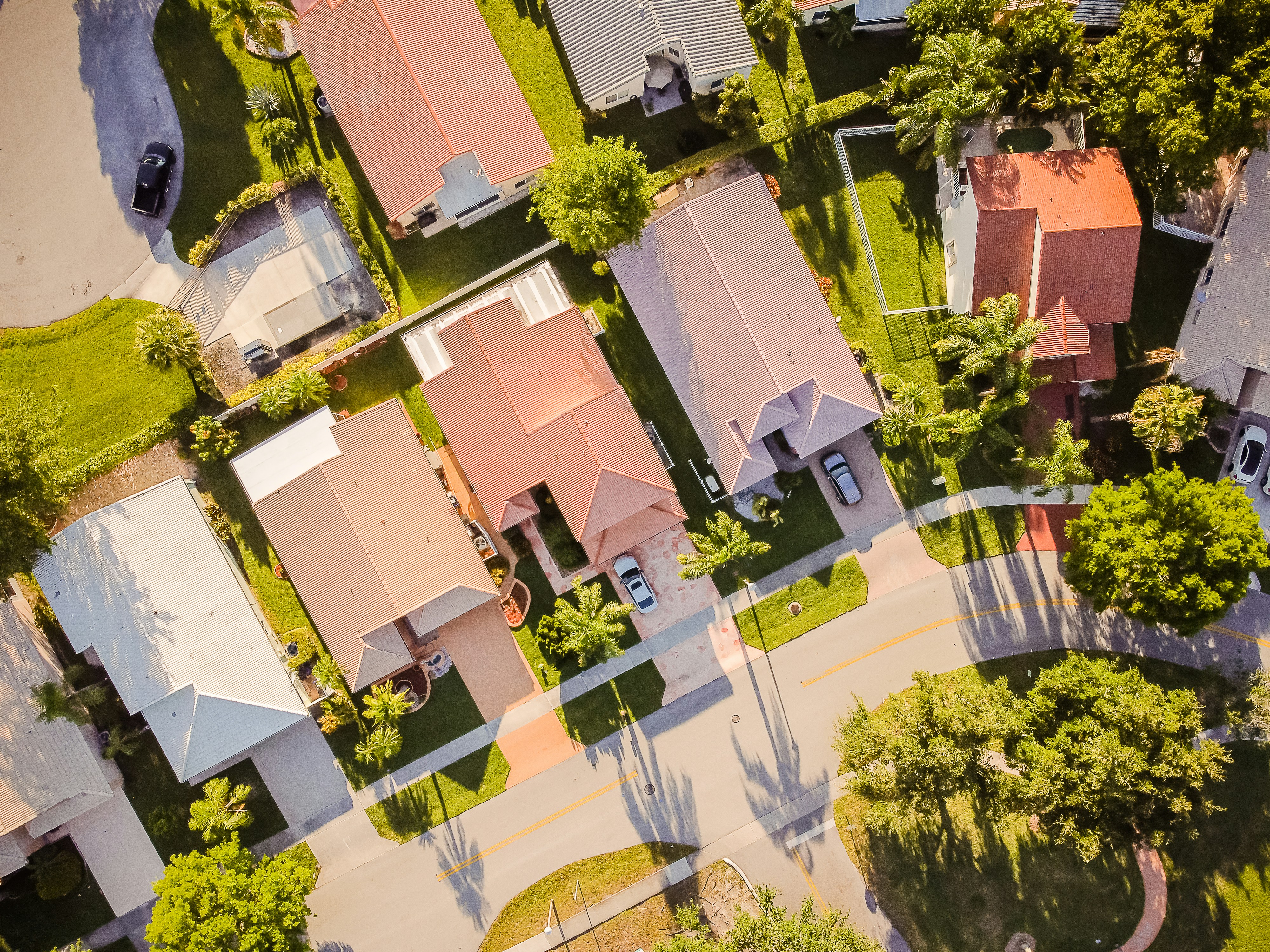 Aerial view of suburban homes showing neighbourhood condition, street context and location factors for Sydney property inspections