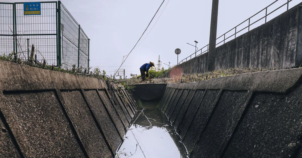 A concrete stormwater drainage channel, the kind of service infrastructure an easement protects on private land